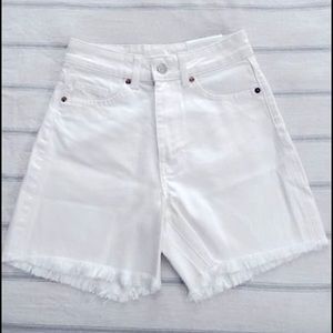 Size 2 H&M high waisted white denim shorts.